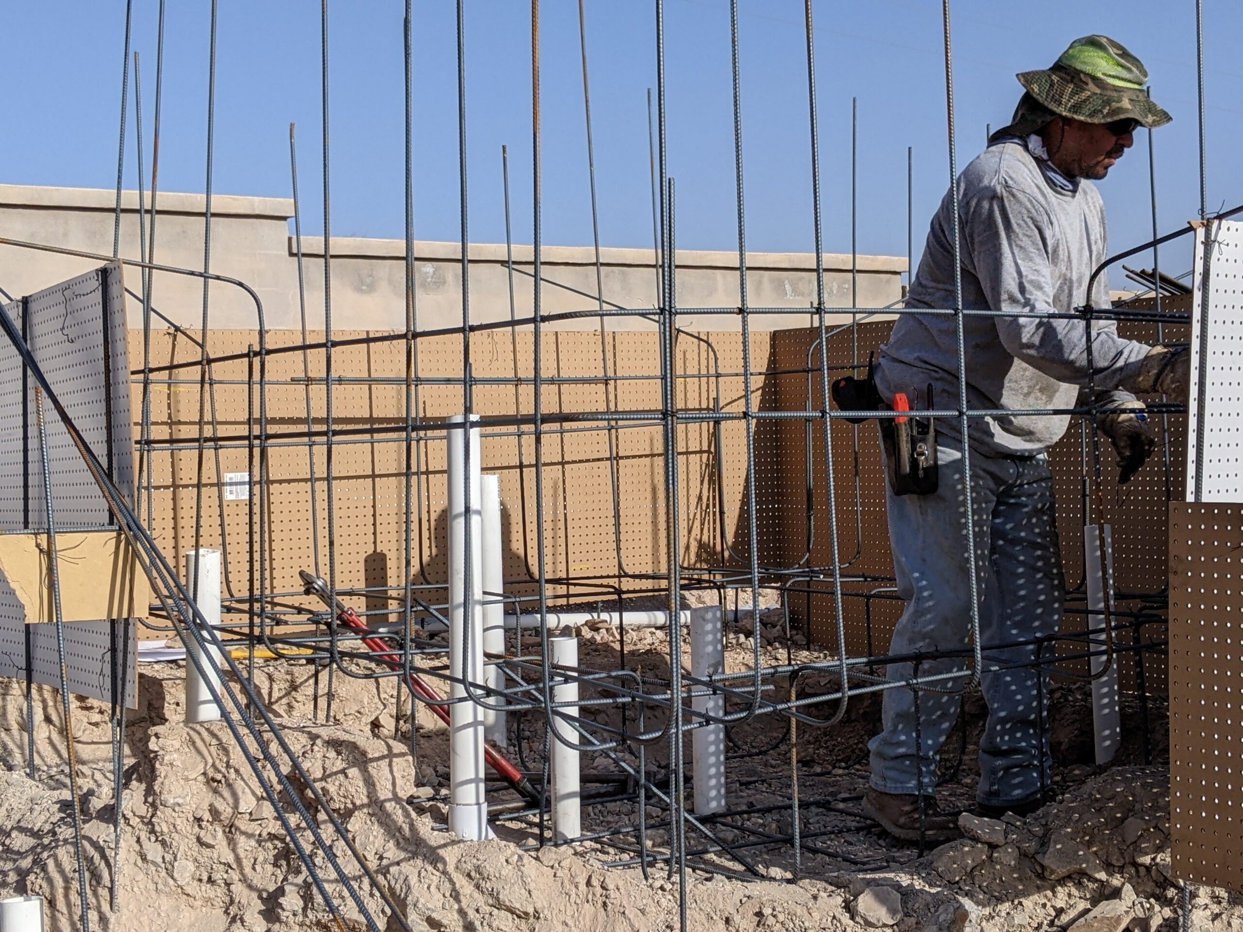 worker tying rebar